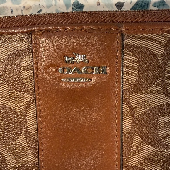 Coach Tan and Brown Signature Zip Wallet
PROJECT - Picture 6 of 9
